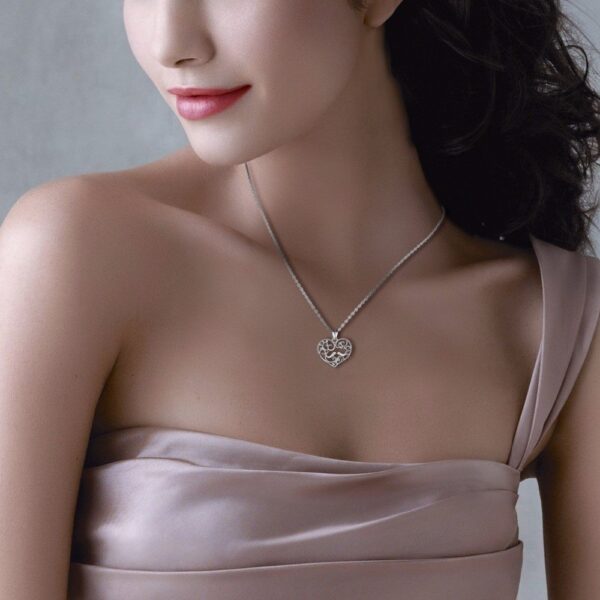 pendentif argent femme oiseaux dans un coeur